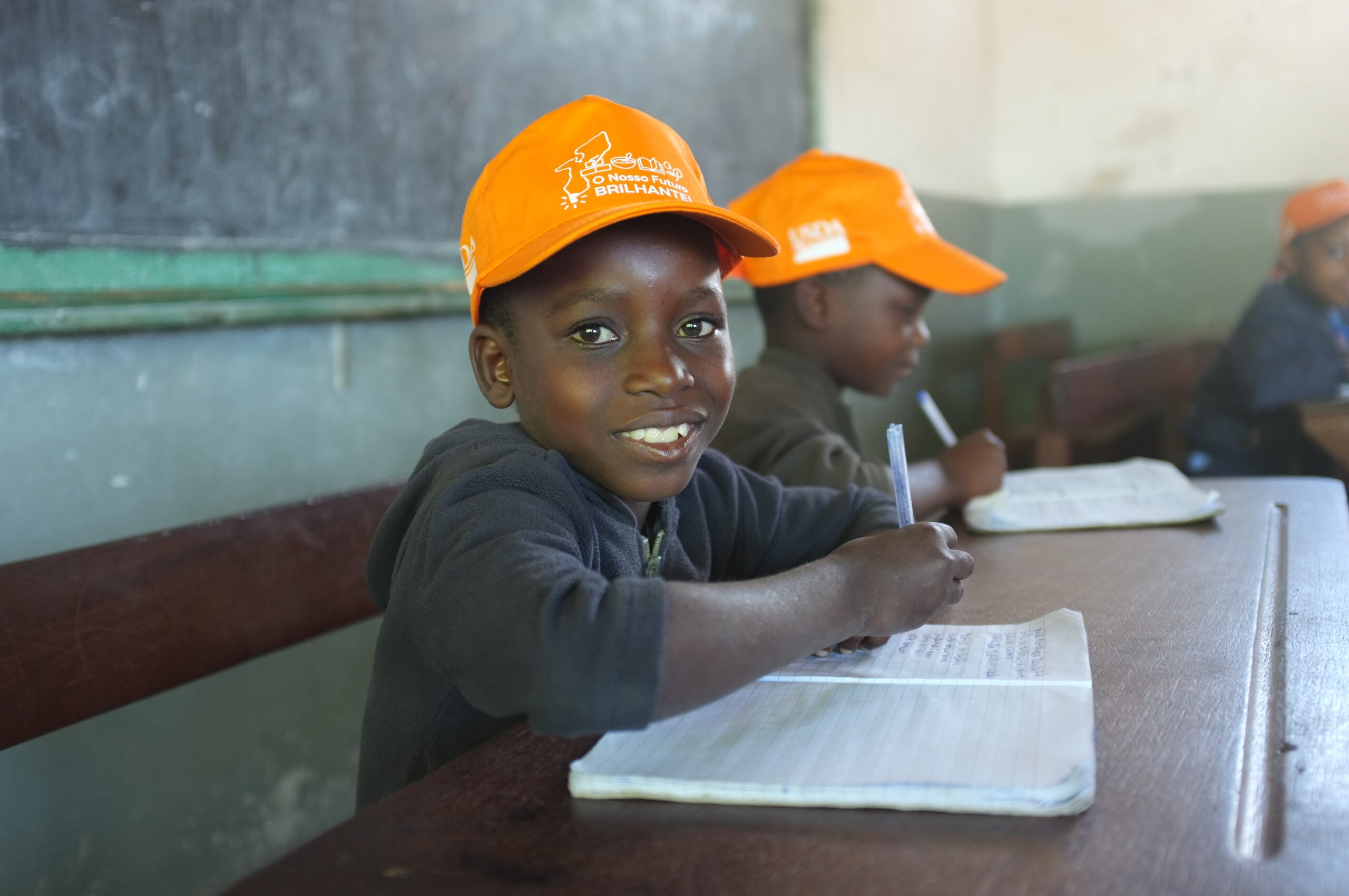 Primary school student in Matutuine, Mozambique practices his writing and reading skills.